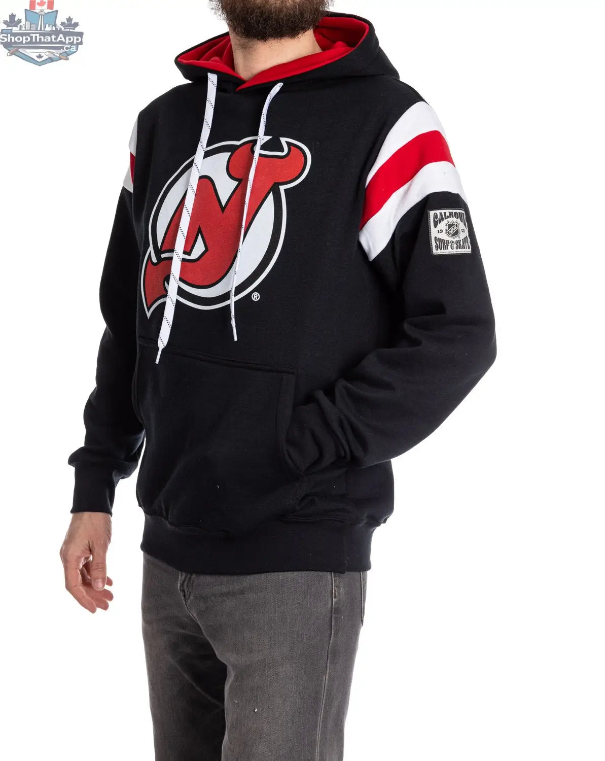 New Jersey Devils retro varsity style hoodie by Calhoun Surf N' Skate, shown from the side with team logo and sporty design.