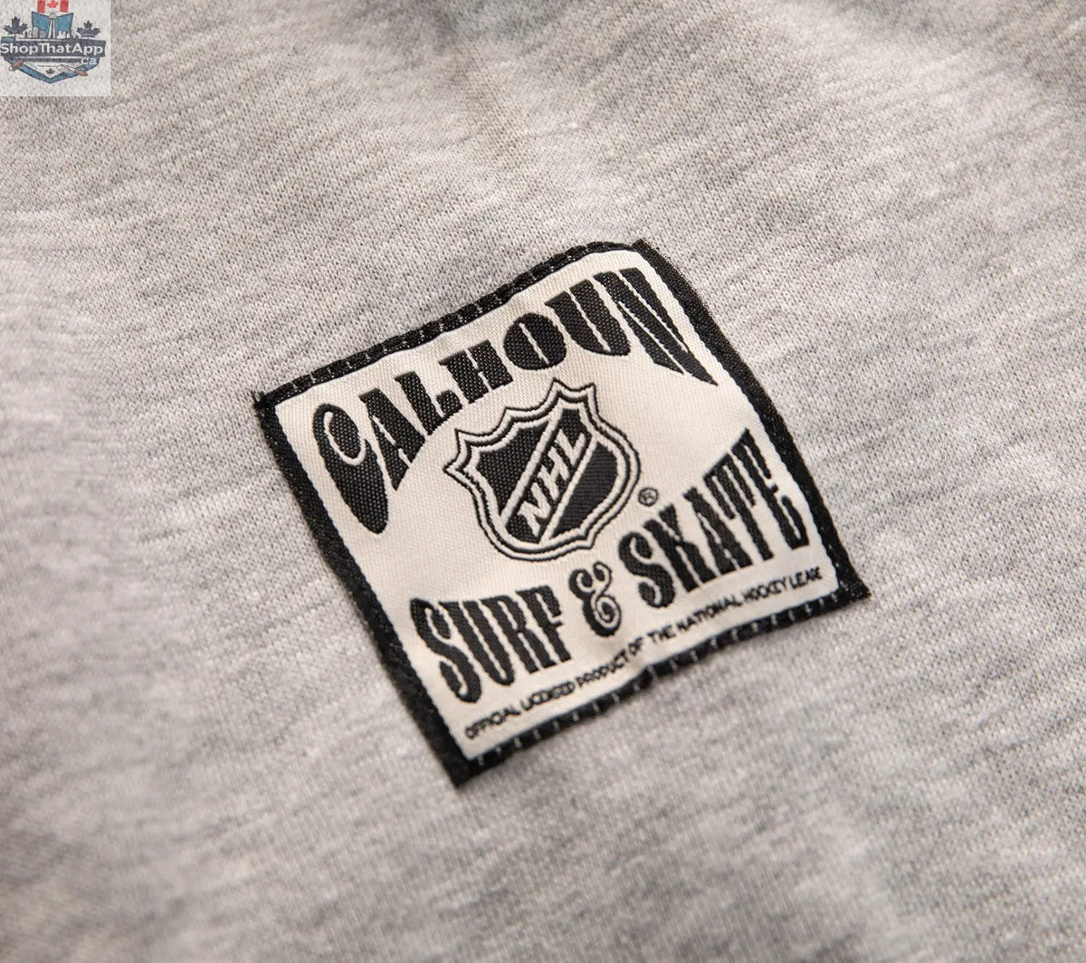 Black Pittsburgh Penguins hoodie with Muskoka-style premium chenille woven logo and jocktag, by Calhoun Surf N' Skate.