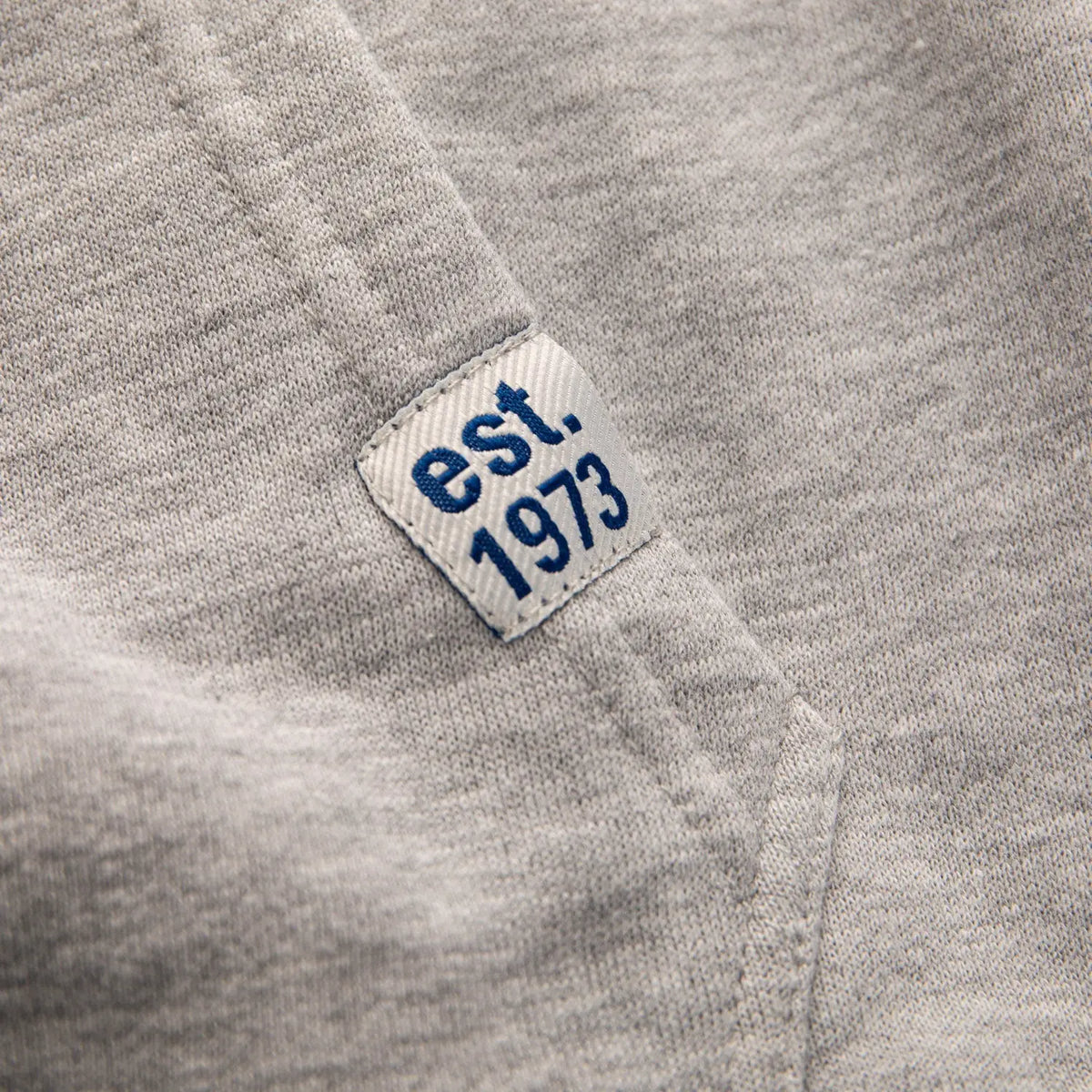 Navy Seattle Kraken hoodie by Calhoun Surf N' Skate featuring Muskoka-style premium chenille woven Kraken logo.