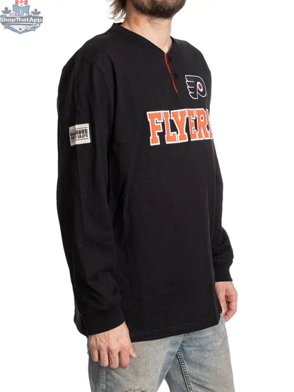 Calhoun Surf N' Skate Philadelphia Flyers long sleeve henley shirt shown from the side, featuring team logo and casual fan apparel style.