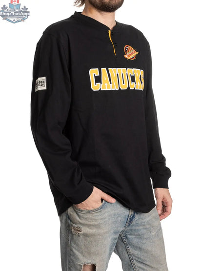 Retro Vancouver Canucks Henley long sleeve shirt by Calhoun Surf N' Skate, shown from the side view.