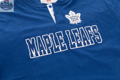 Calhoun Surf N' Skate Toronto Maple Leafs henley long sleeve shirt with team logo and button placket, casual athletic style.