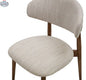 Beige fabric Cammy Dining Chair by Hygge Design House with a cushioned seat and backrest, showcasing stylish and comfortable dining furniture.