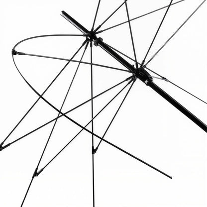 Carbon Loom premium carbon fiber umbrella showing its lightweight, windproof design with a sleek black canopy.