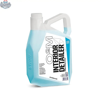 GYEON Q²M Interior Detailer bottle for car interior cleaning, branded by CARZILLA, with a clear label and spray nozzle.