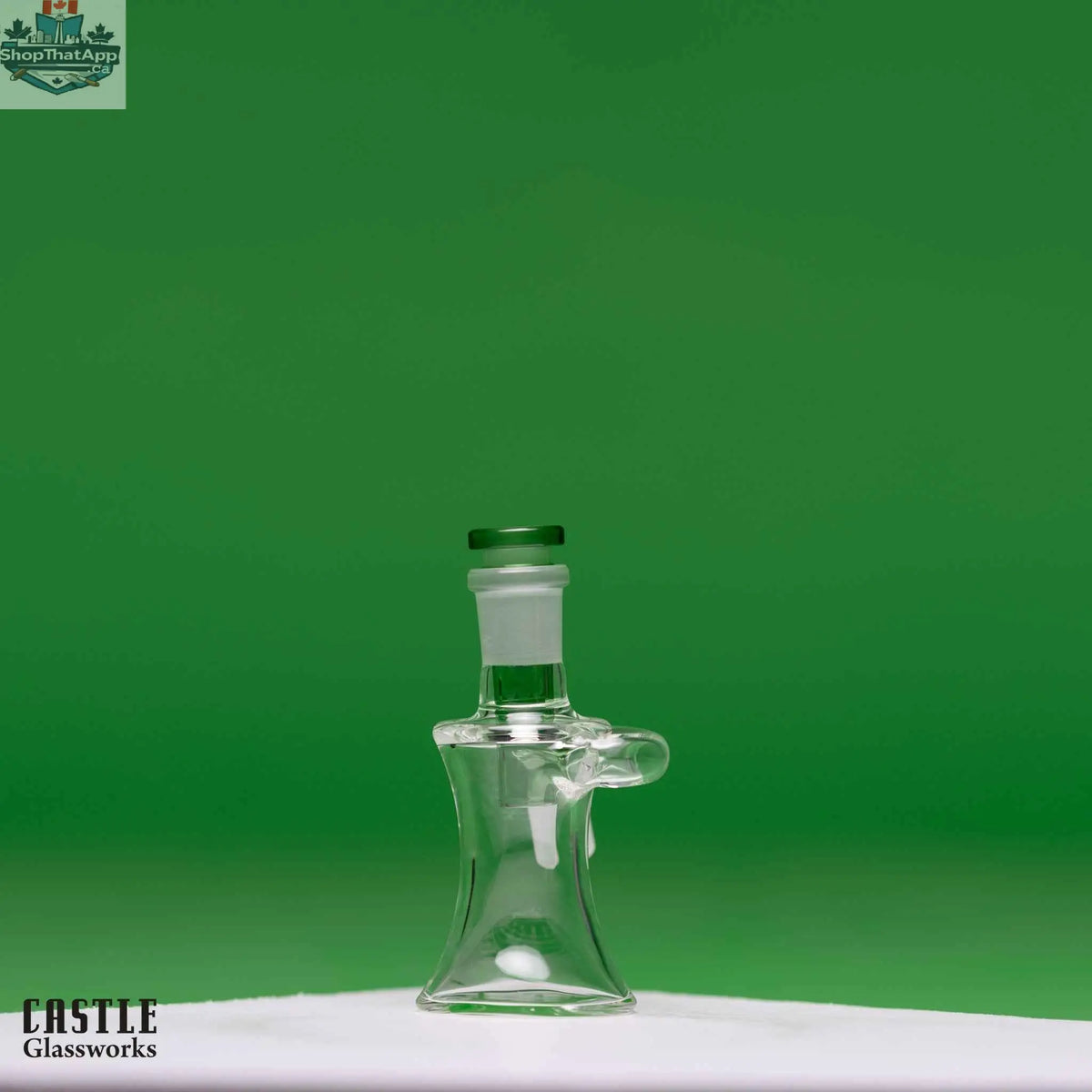 Castle Glassworks 14mm ash catcher for smooth smoking experience, clear glass with intricate design and secure joint connection.