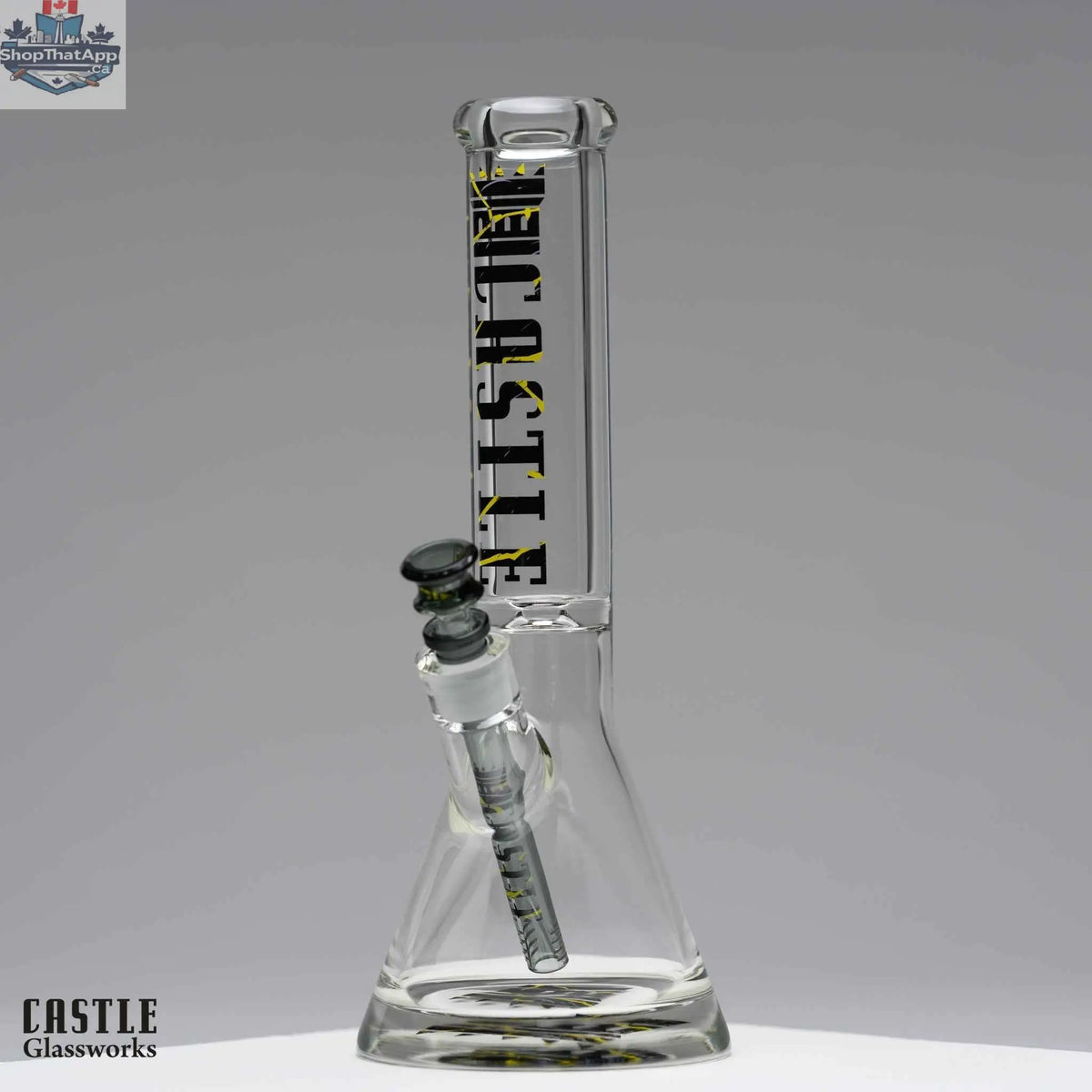 Castle Glassworks 14-inch 9mm beaker bong with a clear glass beaker shape and a sturdy base for smooth smoking.