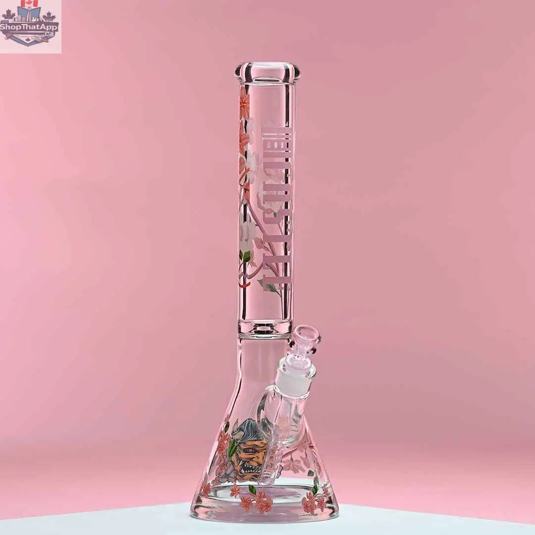 Castle Glassworks 16-inch cherry blossom beaker bong with pink background, 9mm thick glass and beaker shape for smooth hits.