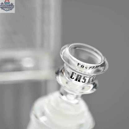 Close-up of Castle Glassworks 18-inch ultra durable beaker bong with a clear bowl on a grey background.