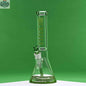 Green 14-inch Castle Glassworks beaker bong with colored logo, 9-hole downstem, on a green background.