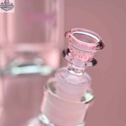 Castle Glassworks 14-inch beaker bong with pink logo, 9mm thickness, and 9-hole downstem, shown with pink background and close-up bowl.