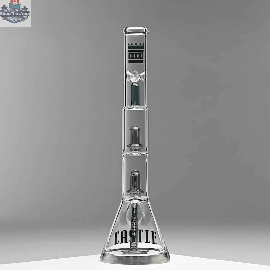 Grey Castle Glassworks double showerhead beaker bong, 18-inch with innovative design for smooth hits, shown against a grey background.