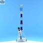 Blue Castle Glassworks double showerhead beaker bong with blue background, 18-inch height, and innovative design for smooth hits.