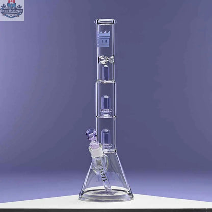 Purple Castle Glassworks beaker bong with double showerhead percolators and a sleek 18-inch design, shown against a purple background.