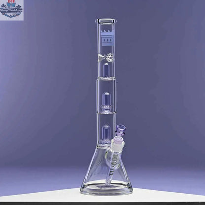 Purple Castle Glassworks double showerhead beaker bong with a sleek design, set against a purple background, for smooth smoking hits.