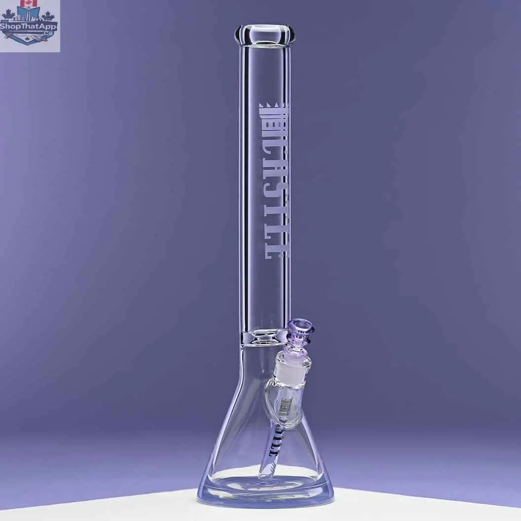18-inch Castle Glassworks beaker bong with purple logo, 9mm thick glass, shown against a purple background from the right angle.