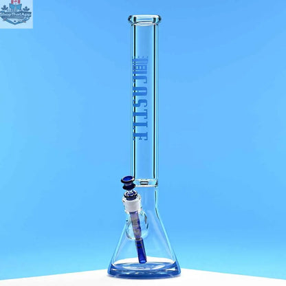 18-inch glass beaker bong by Castle Glassworks with blue logo, 9mm thick glass, clear design, and blue background in left photo.