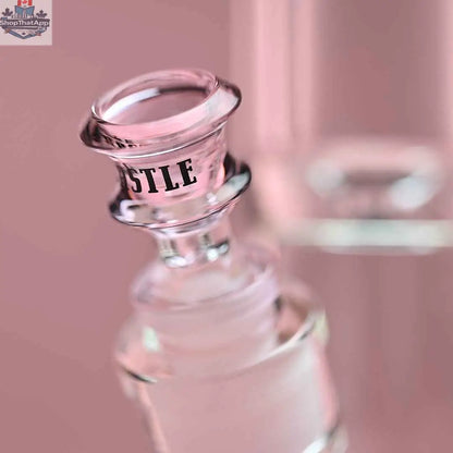 Pink 18-inch glass beaker bong by Castle Glassworks with colored logo, 9mm thick glass and close-up of bowl on pink background.