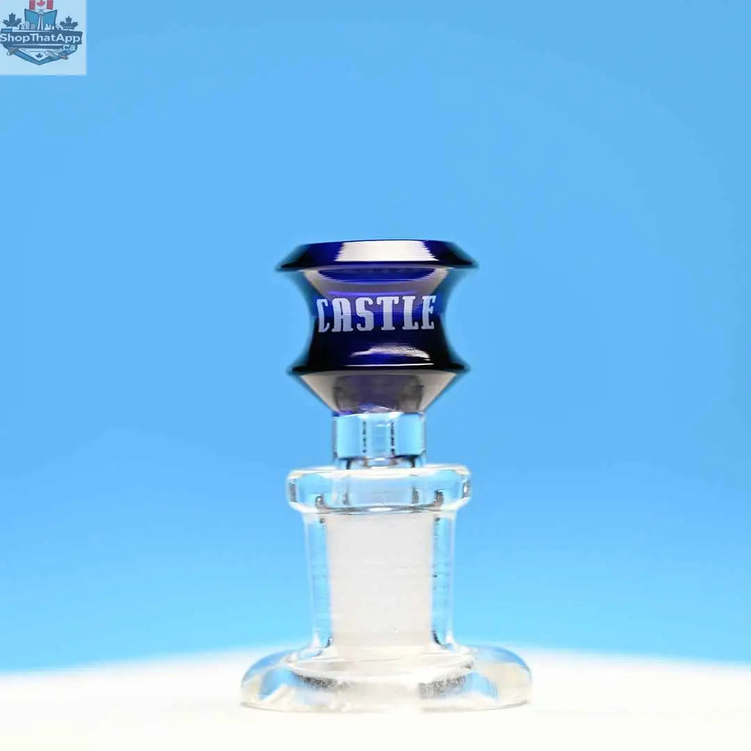 Blue 14mm borosilicate glass bowl with disk design, durable and transparent, by Castle Glassworks on a blue background.