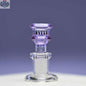 Purple 14mm borosilicate glass bowl with durable disk design from Castle Glassworks, shown against a purple background.