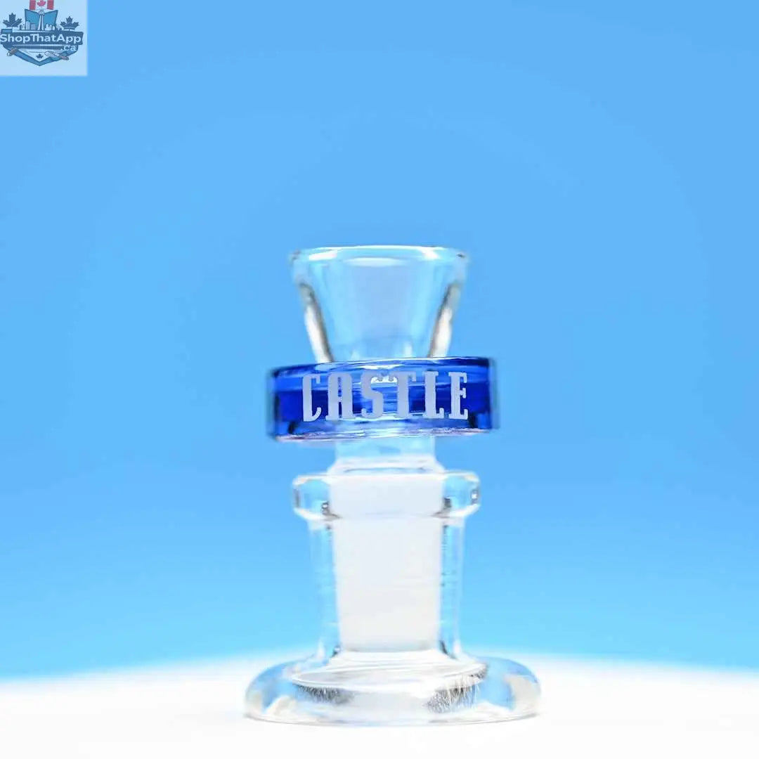 Blue 14mm borosilicate glass bowl piece by Castle Glassworks, designed for puck bowls, with a vibrant blue background.