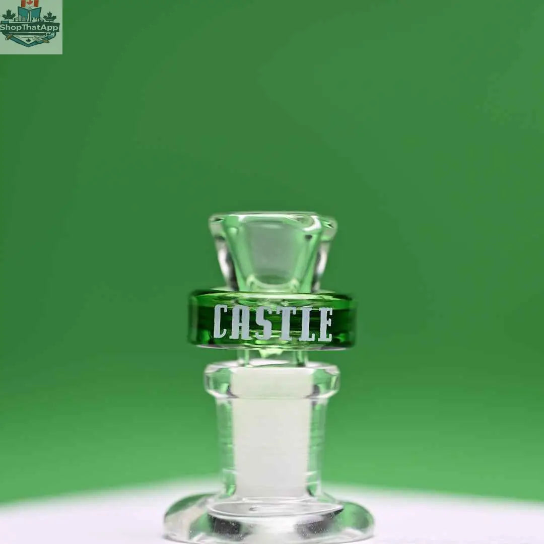 Green 14mm Castle Glassworks borosilicate glass bowl for puck-style bowls, with a clear, smooth design and green background.