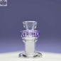 Purple 14mm borosilicate glass bowl piece for puck bowls by Castle Glassworks on purple background.