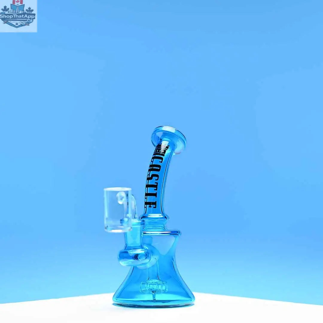 Mini Castle Glassworks electroplated 7-inch high-performance dab rig with a blue background, showcasing its sleek design and glass details.