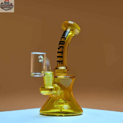 Yellow Castle Glassworks mini dab rig with electroplated finish, 7-inch high-performance dab rig on amber background.