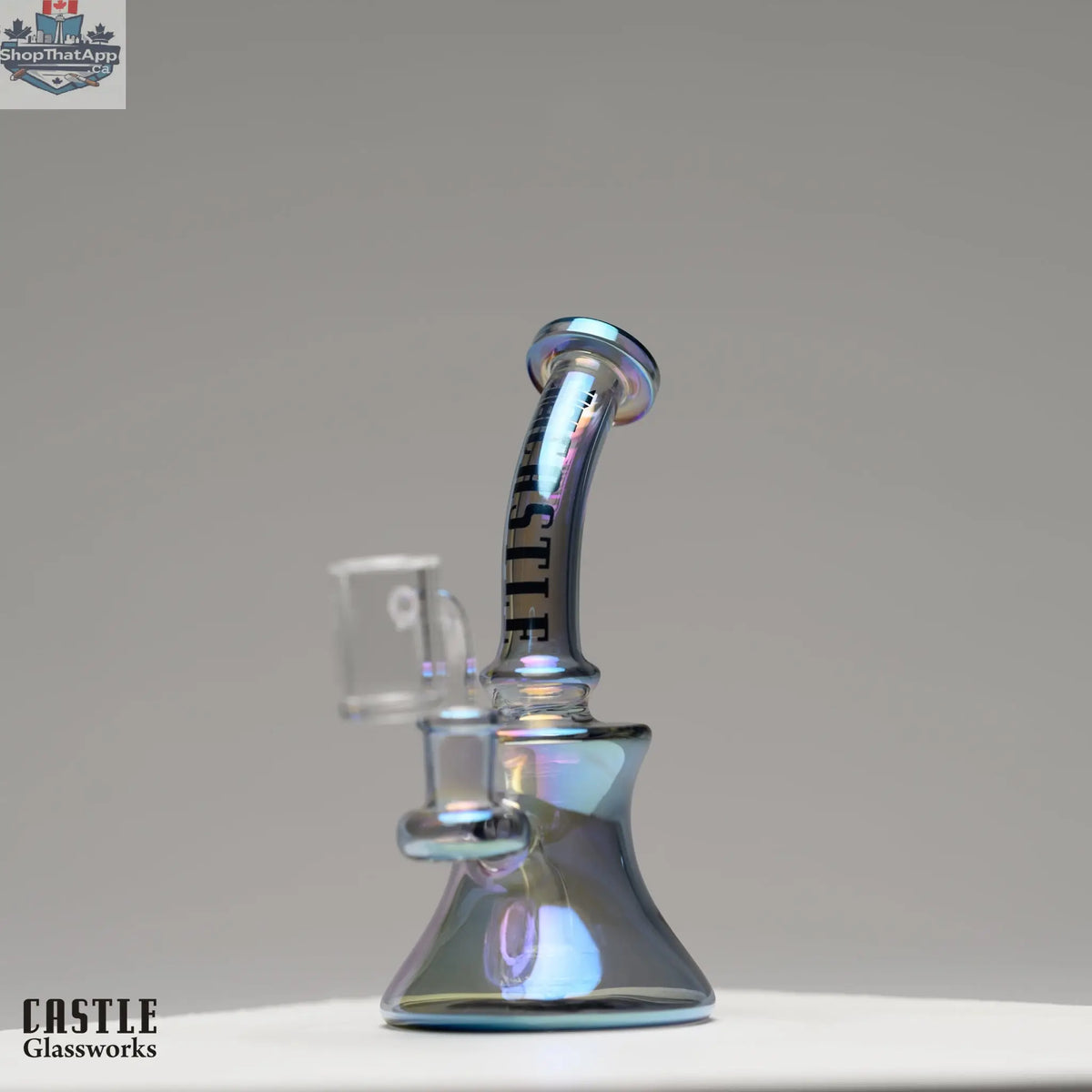 Castle Glassworks 7-inch electroplated mini dab rig with intricate glass design, high-performance concentrate vaporizer apparatus.