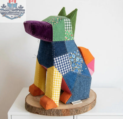 Sewing pattern for a plush guard dog by Sofs Lifestyle, featuring detailed design and made in Canada, on a white background.