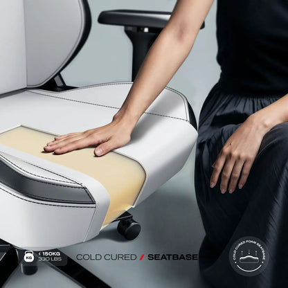 Cybeart Apex Series Arctic White gaming chair with ergonomic design, plush cushioning, and sleek white finish for ultimate comfort.