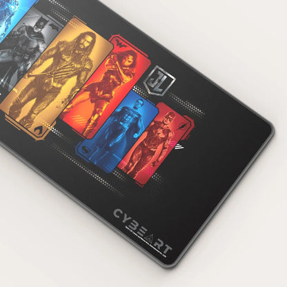 Justice League gaming mouse pad by Cybeart featuring character portraits on a smooth fabric surface for gamers.