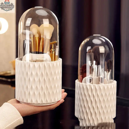 Transparent 360 rotating makeup brush organizer with large capacity, holding various makeup brushes and tools in a clear, accessible design.