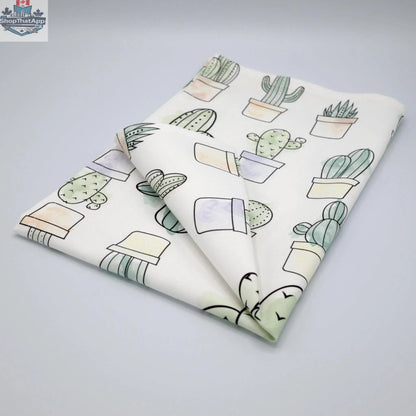 Folded Hem And Tassel Desert Haze watercolor cactus printed kitchen towel featuring vibrant desert-inspired artwork.