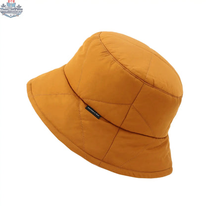 Northern Sun bucket down hat, stylish and functional hat for all occasions, shown in a casual outdoor setting.