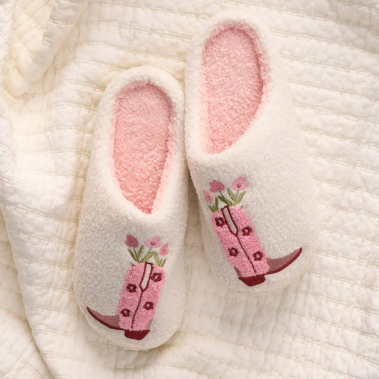 Pink cowgirl boots with fuzzy exterior by Pinky Mimosa, featuring a stylish Western design and comfortable fit.