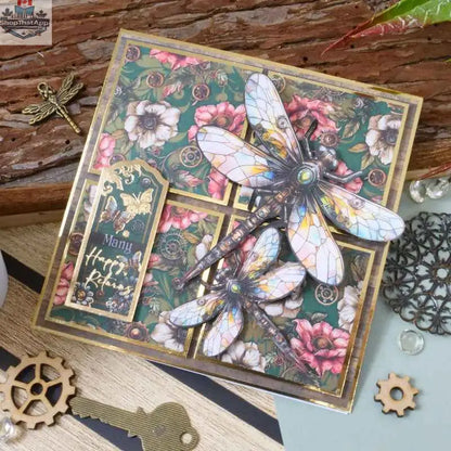 Ecstasy Crafts Clockwork Curiosities paper pad, 8x8 inches, featuring intricate vintage-inspired designs for creative crafts and scrapbooking.