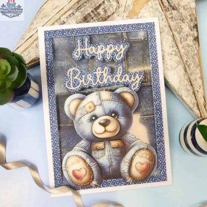 Open book of denim-themed paper and cardstock from Ecstasy Crafts, showcasing textured blue denim patterns and craft designs.