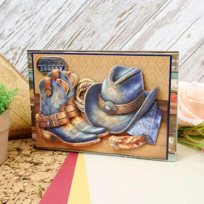 Close-up of The Little Book of Denim paper and cardstock by Ecstasy Crafts, showcasing blue denim-inspired textured paper.