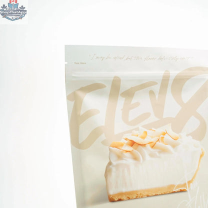 Cream of Rice coconut cream pie flavor by Elev8, showing a bowl of creamy coconut rice dessert topped with shredded coconut.