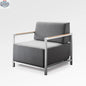 Enclover Acacia lounge chair with Sunbrella® cushions, showcasing a stylish outdoor chair with comfortable padding and modern design.