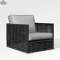 Enclover Chestnut Club Chair with Sunbrella® cushions, featuring a stylish design and plush upholstery for comfortable seating.