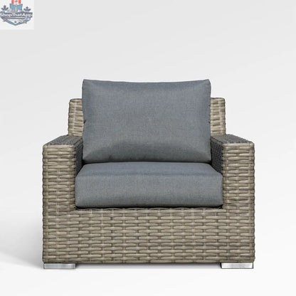 Enclover Jasmine club chair with Sunbrella cushions in cast slate fabric, showing a stylish and comfortable outdoor seating option.
