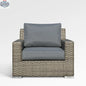 Enclover Jasmine club chair with Sunbrella cushions in cast slate fabric, showing a stylish and comfortable outdoor seating option.