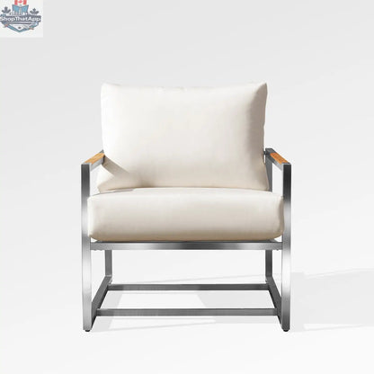 Enclover Acacia club chair with Sunbrella cushions, stylish outdoor seating with a woven wood look and bird pattern fabric.