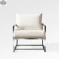 Enclover Acacia club chair with Sunbrella cushions, stylish outdoor seating with a woven wood look and bird pattern fabric.
