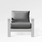 Enclover Hickory Lounge Chair with white Sunbrella cushion, designed for Acacia Lux sectional outdoor seating.