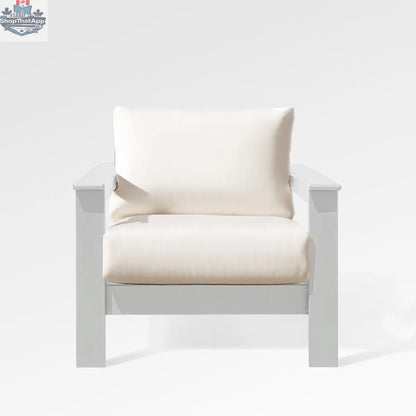 Enclover Hickory Lounge Chair with white Sunbrella cushion, designed for Acacia Lux sectional, showcasing front view and comfortable seating.
