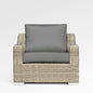 Enclover Tulip lounge chair with Sunbrella® cushions, featuring a sleek design, shown from the front, perfect with pine sling loveseat.